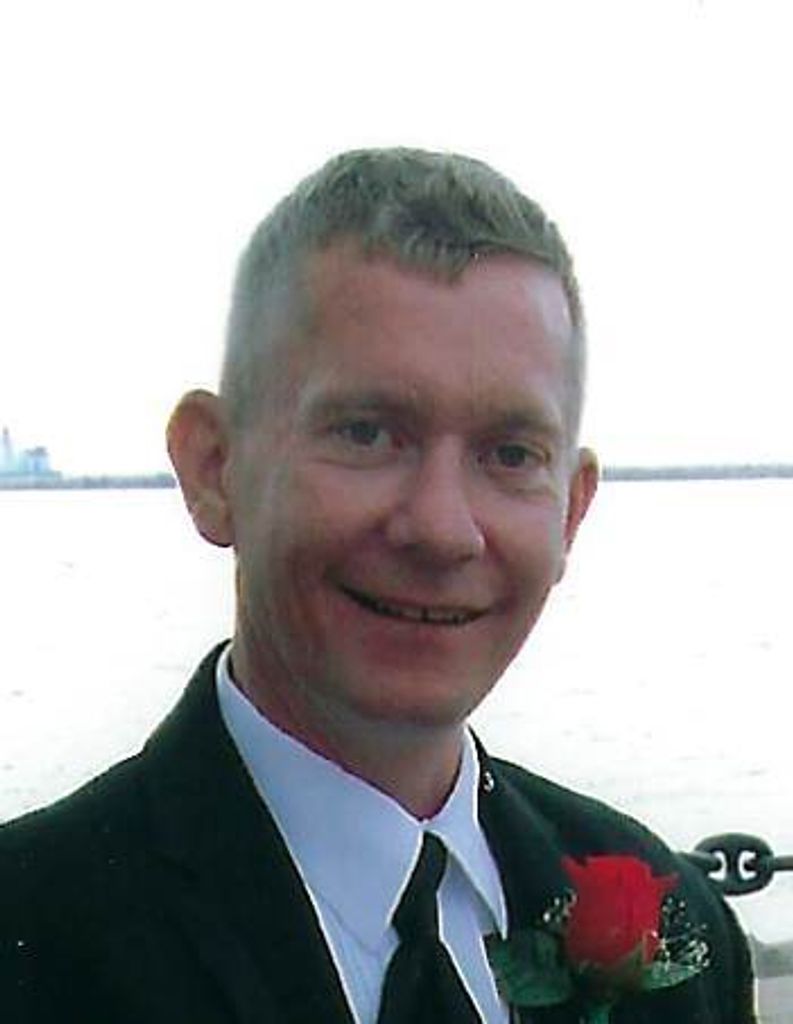 John C. Arvai