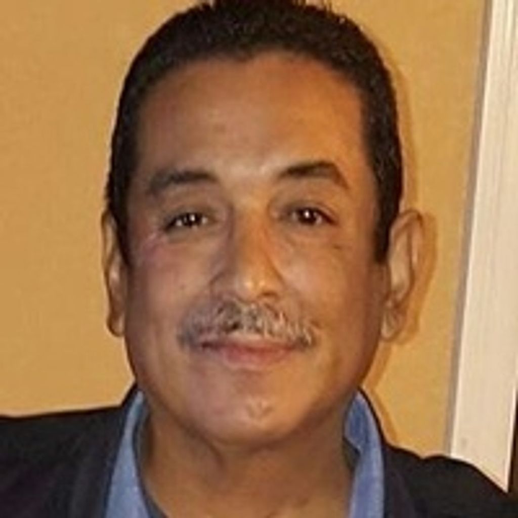 Juan  Carlos Bueno,  Sr.