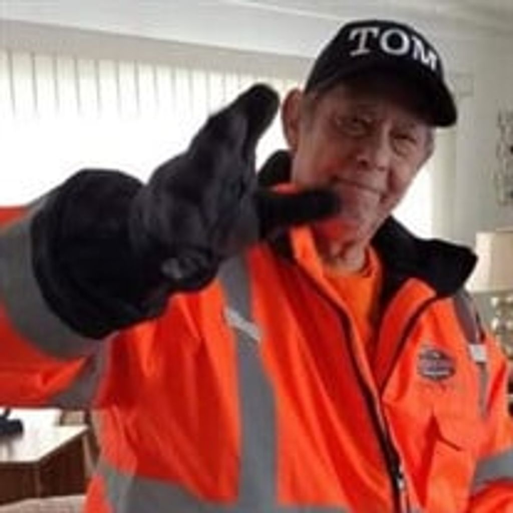 Thomas "Tom" Corky Darland