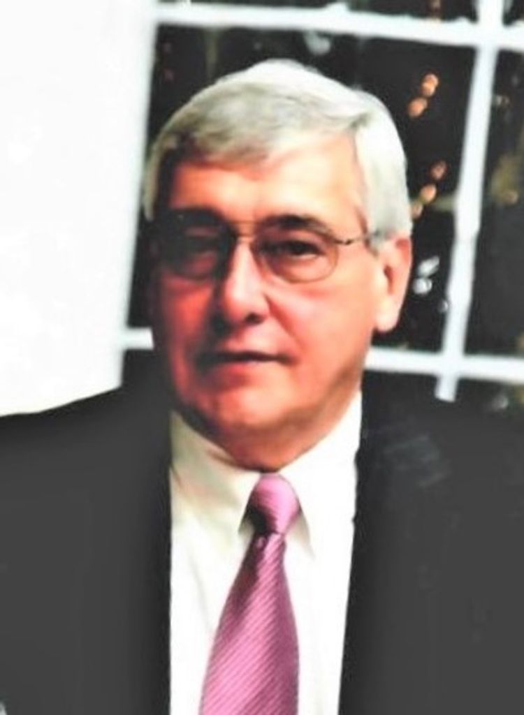 John E. Schlosser