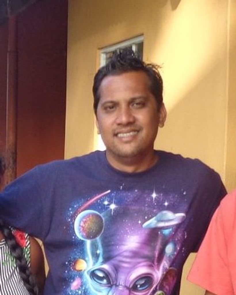 Johnny J. Ramcharan Profile Photo