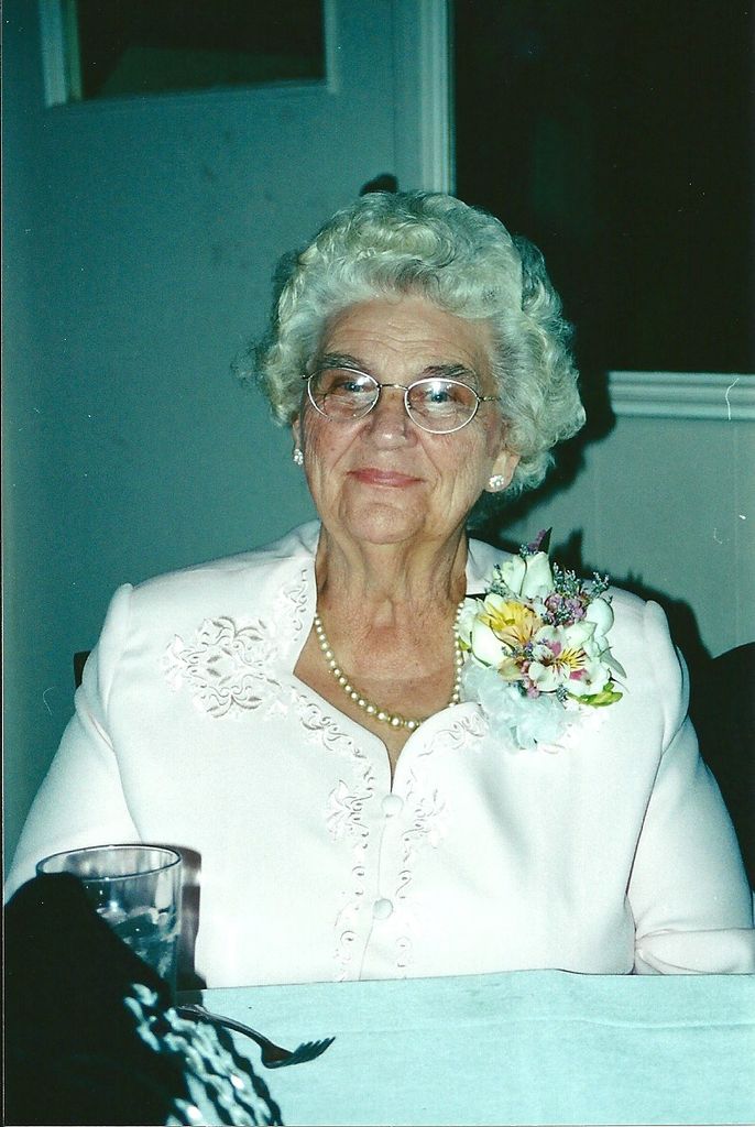 Edna L Baade