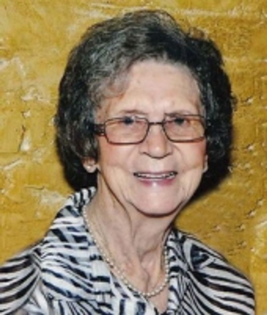 Laura "T-Lou" Comb