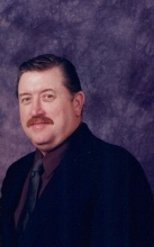 Richard "Dick" Elliot Isacson