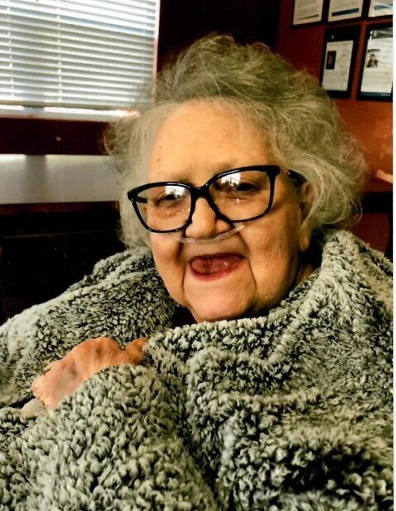 Emma J. Breech