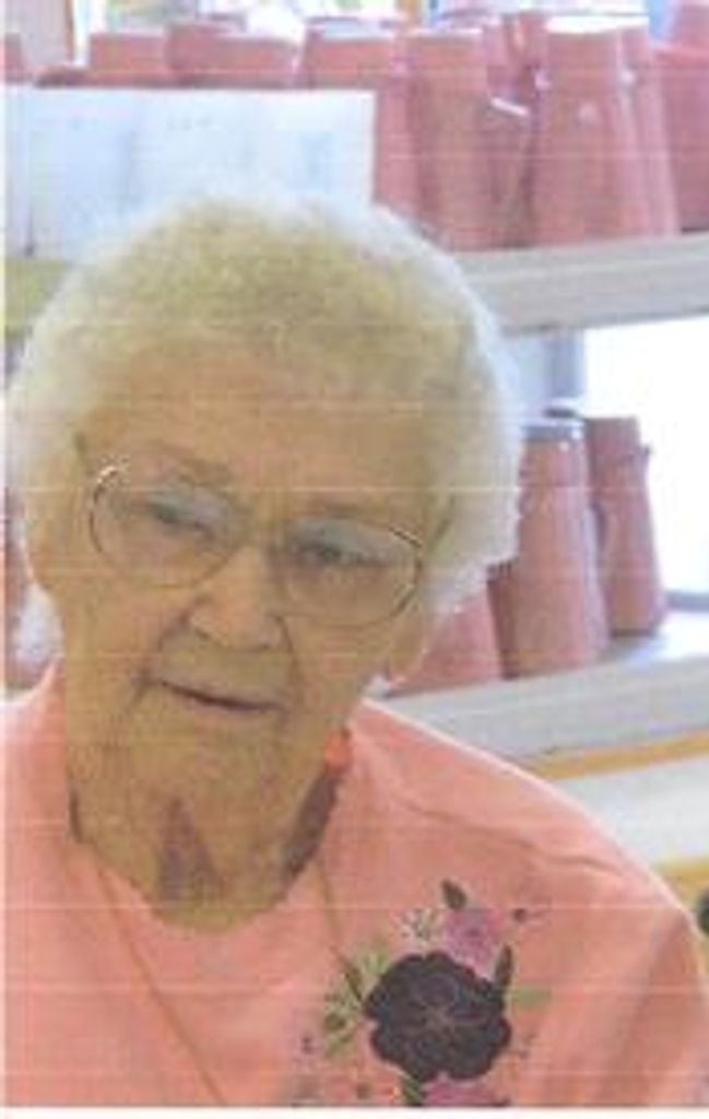 Kathleen P Woods