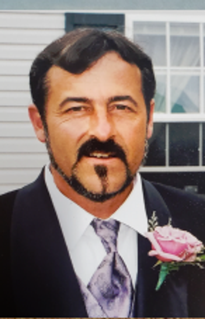 Roger “Buck” Becker