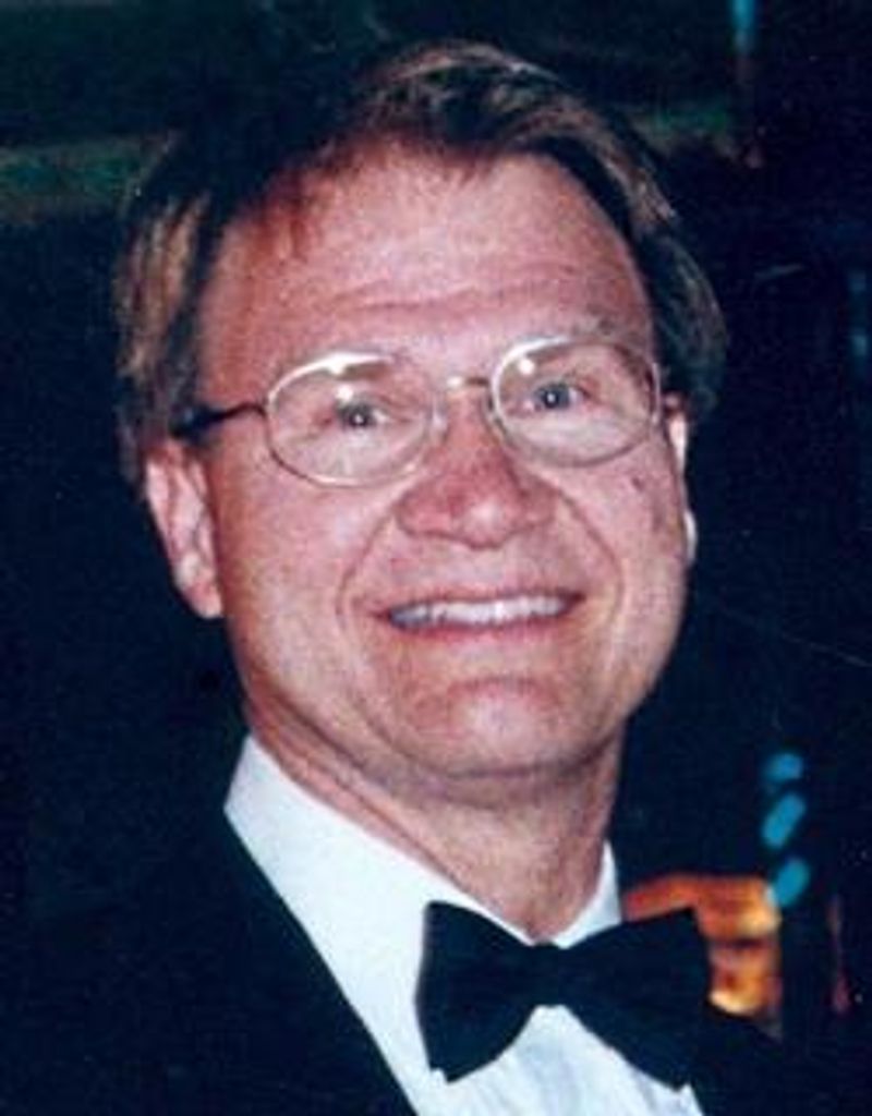Dennis L Church