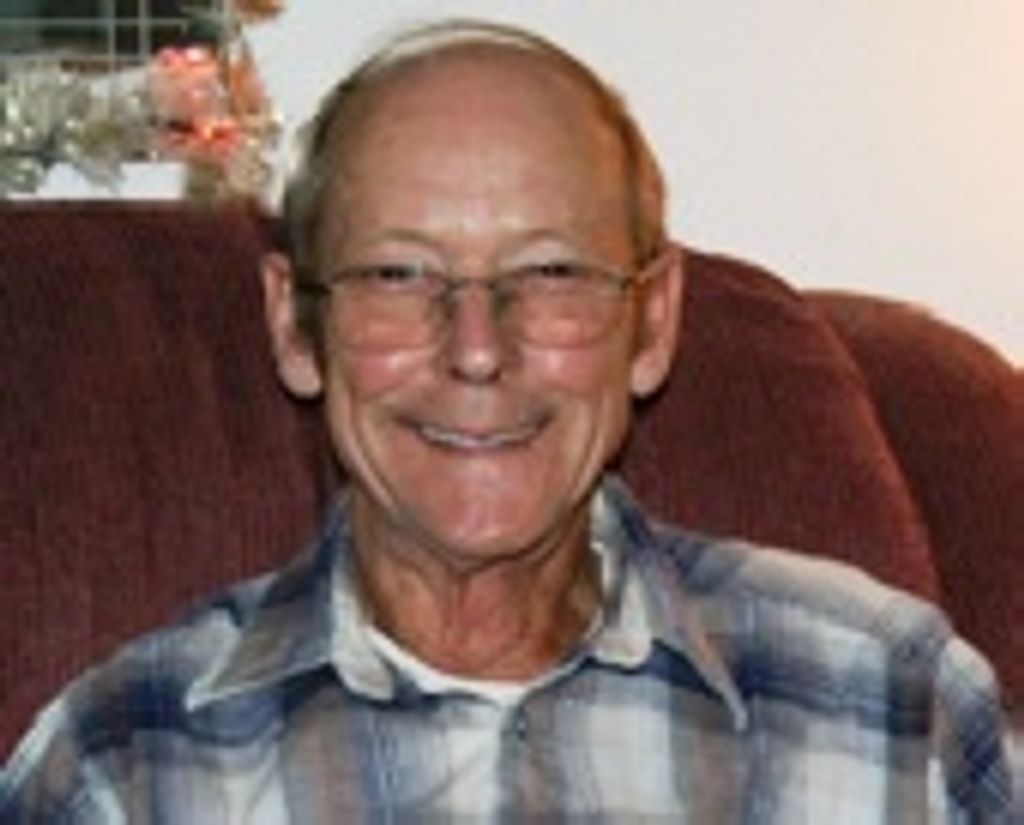 Thomas  E. Toops