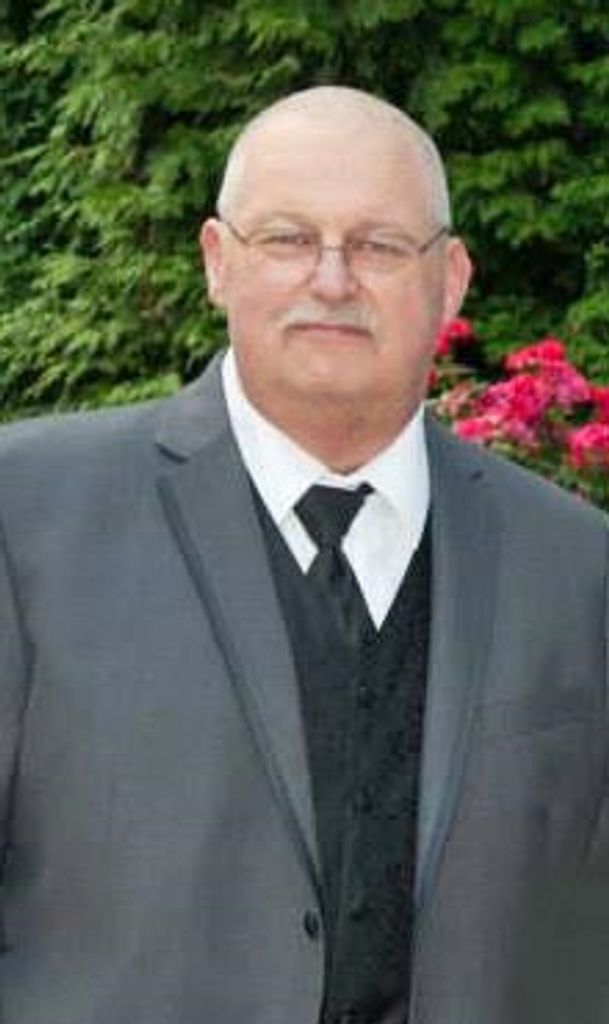 John E. Obertlik