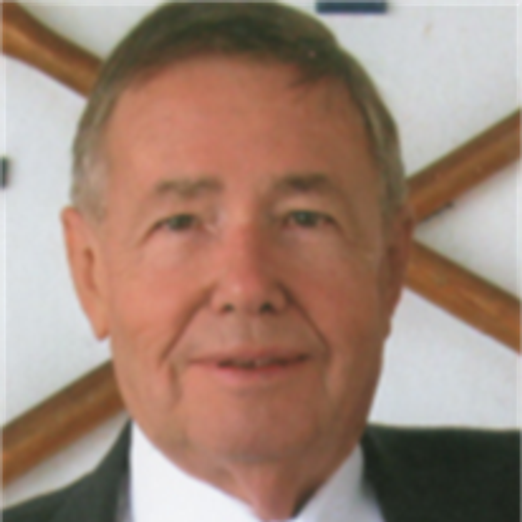 Thomas E. "Tom" Warren