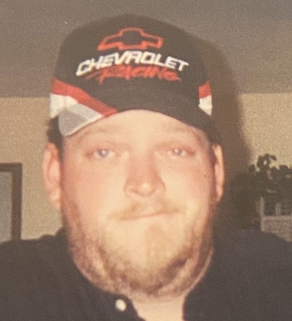 Kyle E. Cox