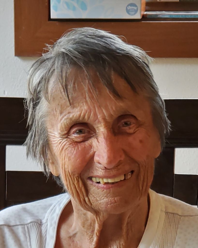 Carol J Courneene