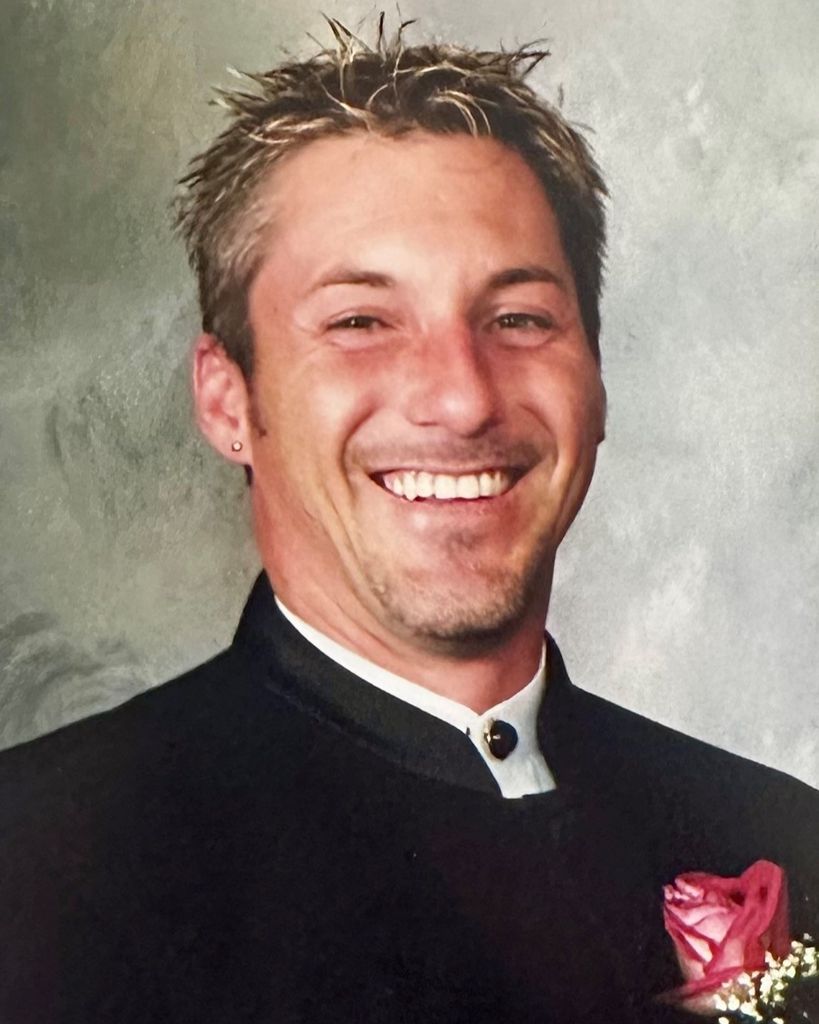 John Wayne "DJ KrAzY" Ponder