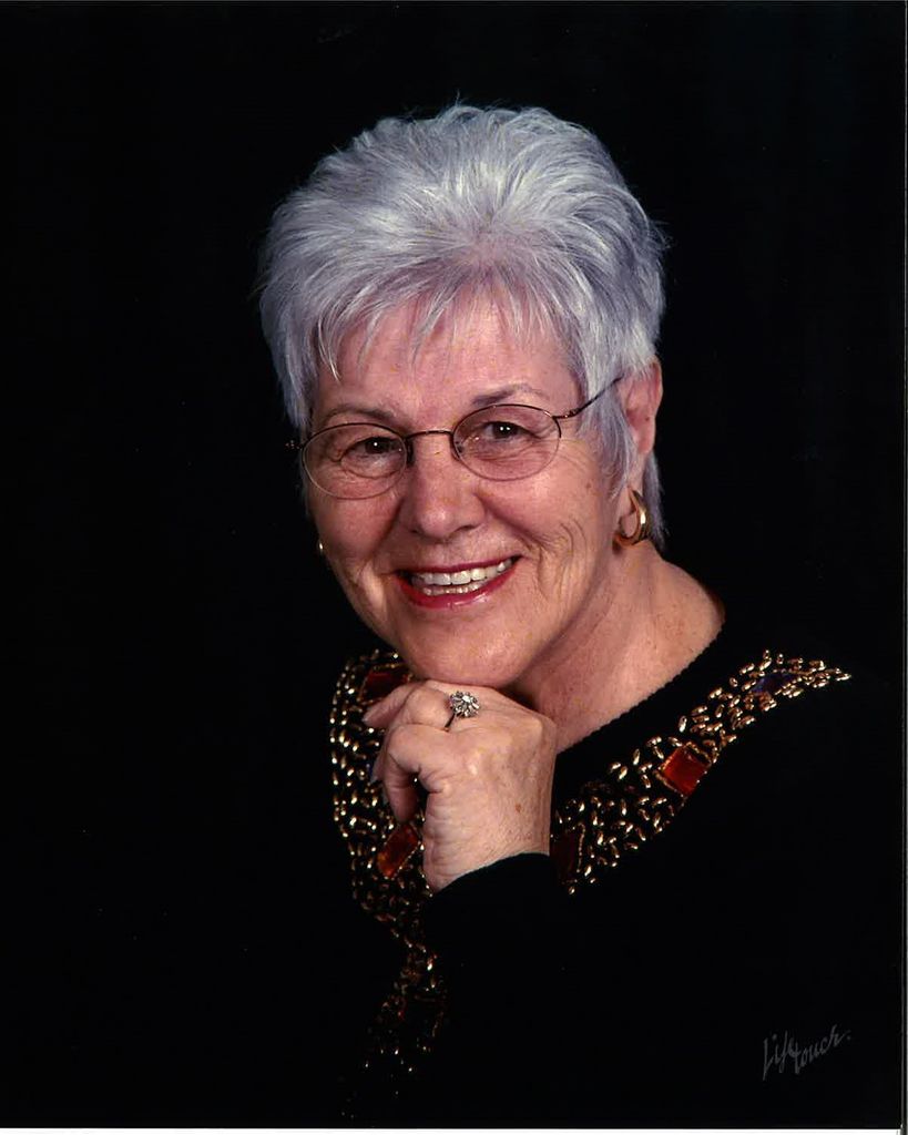 "Mitzi" Delores M. Murphy