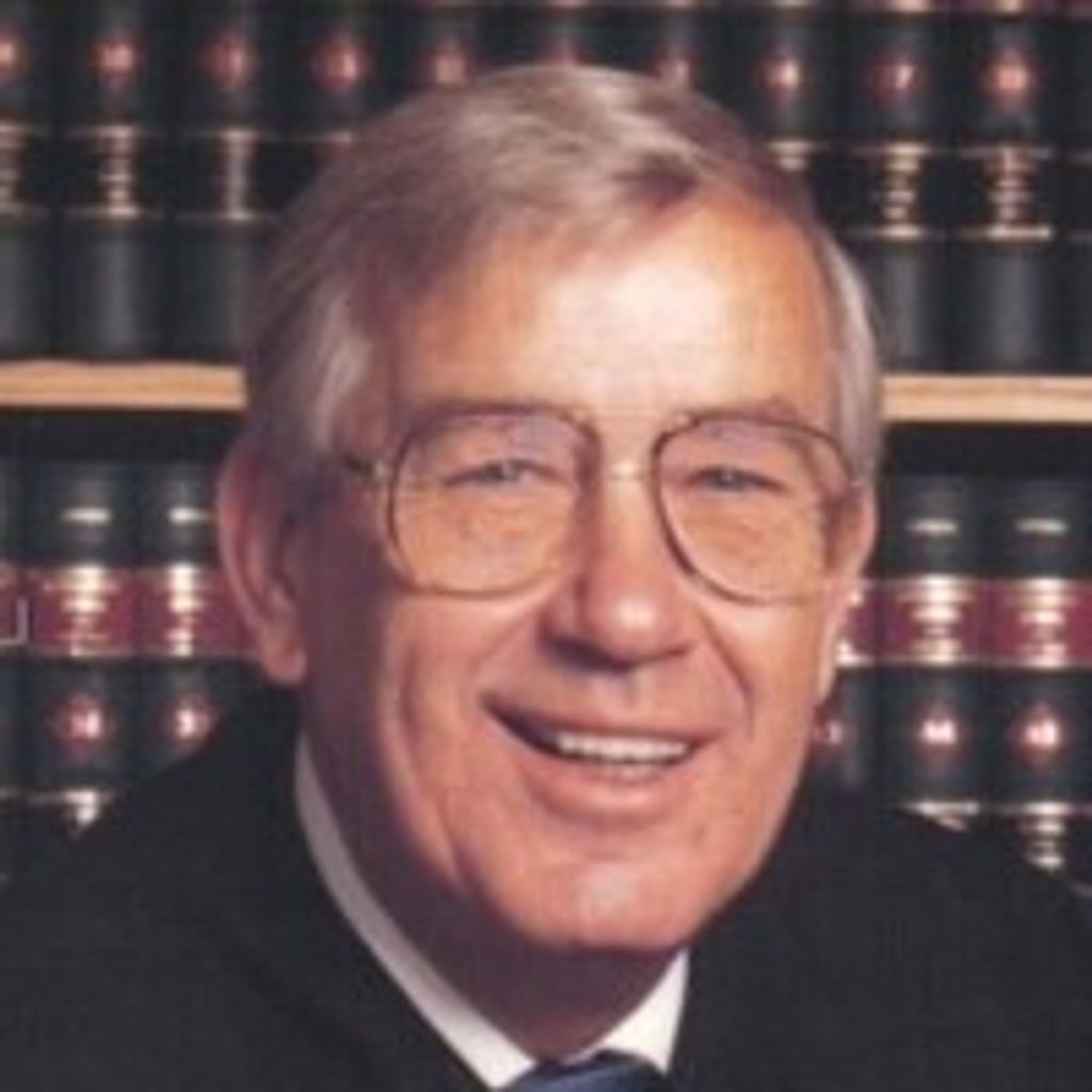Hon. Donald K. Comstock