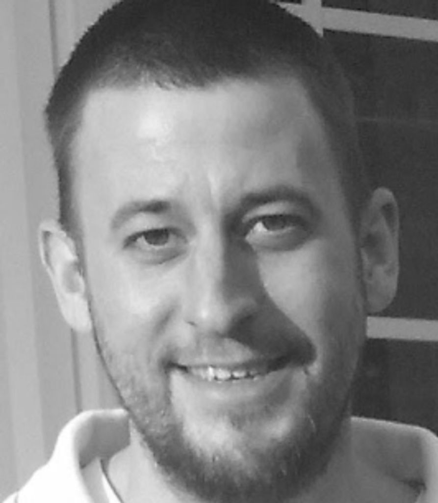 Dustin J. Magarrell