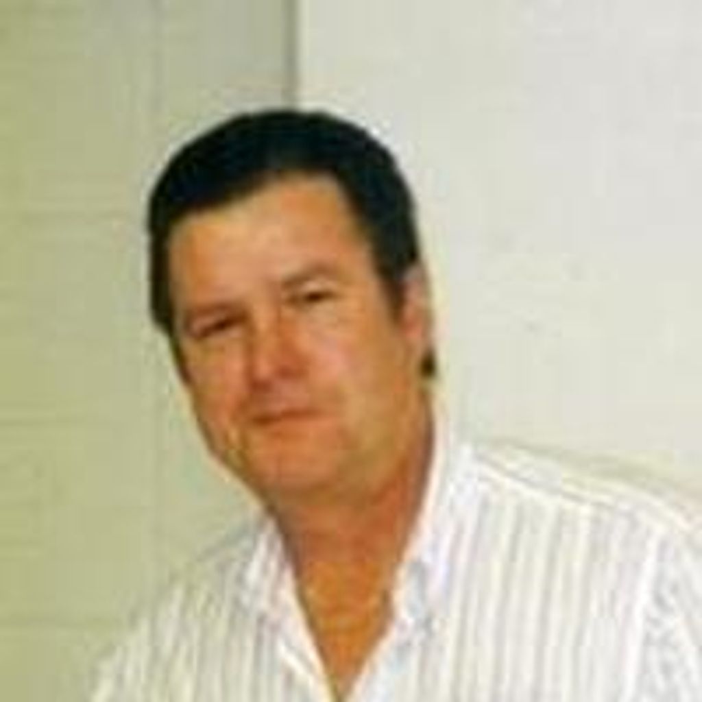 Dennis J White