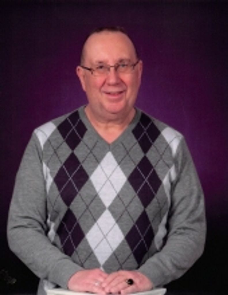 Roger  E. Klump