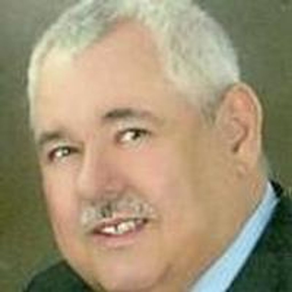 Stanley  E. Minder