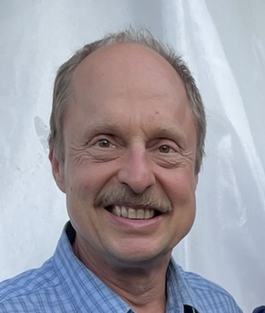 Mr. Claude F. Oesterle