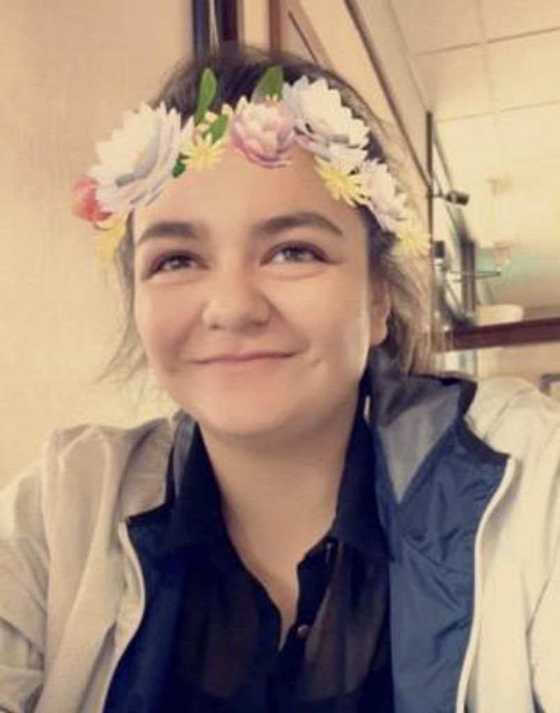 De Los Santos, Angel Marie