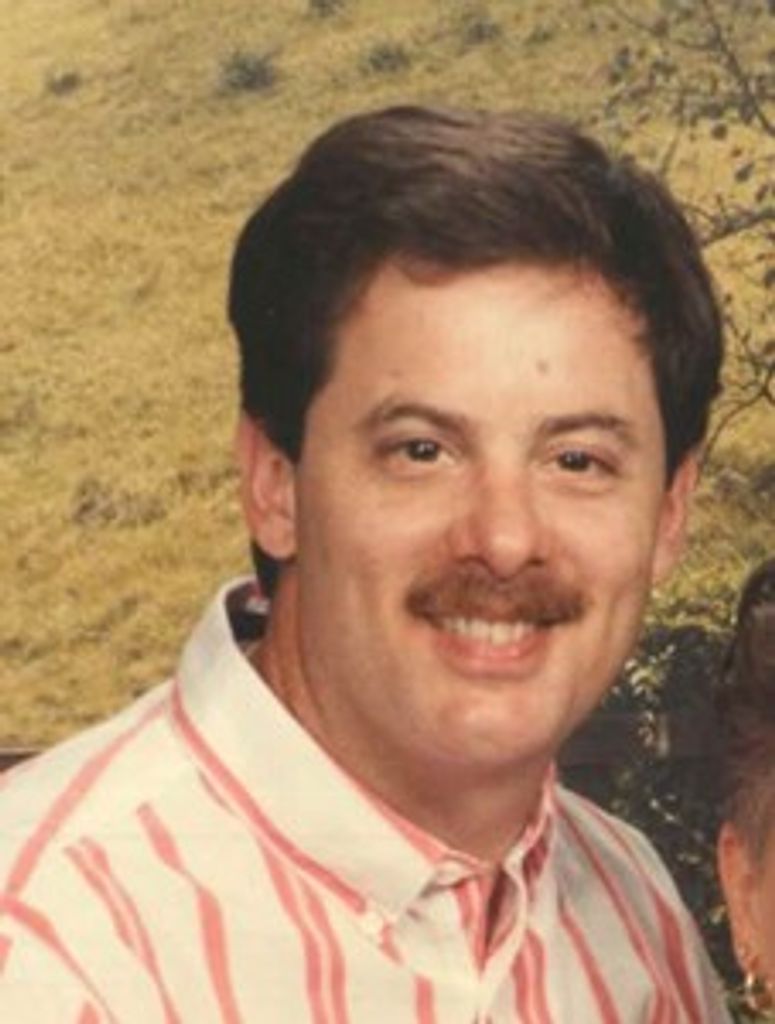 Gregory E. Cole