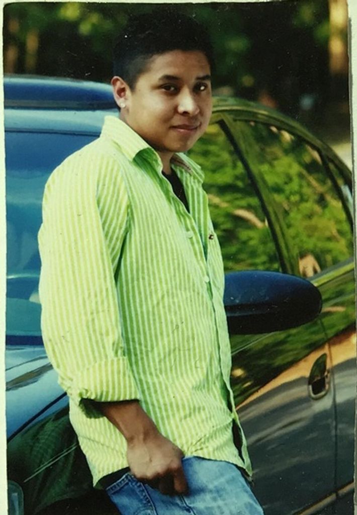 Tallsun John "T.J." Obe