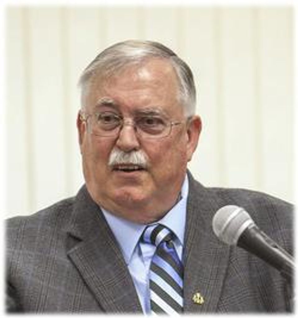 The Honorable Fred R. Dollison