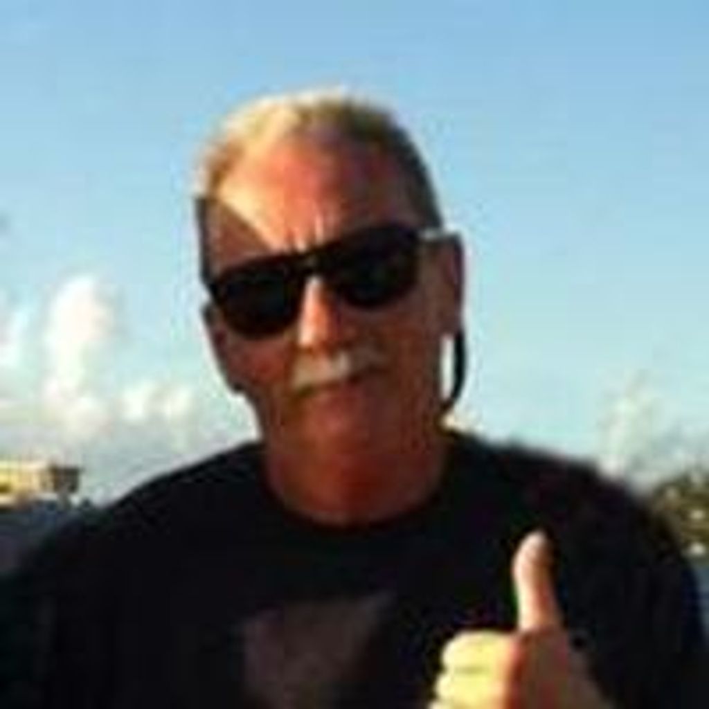 Mark  E. Lund