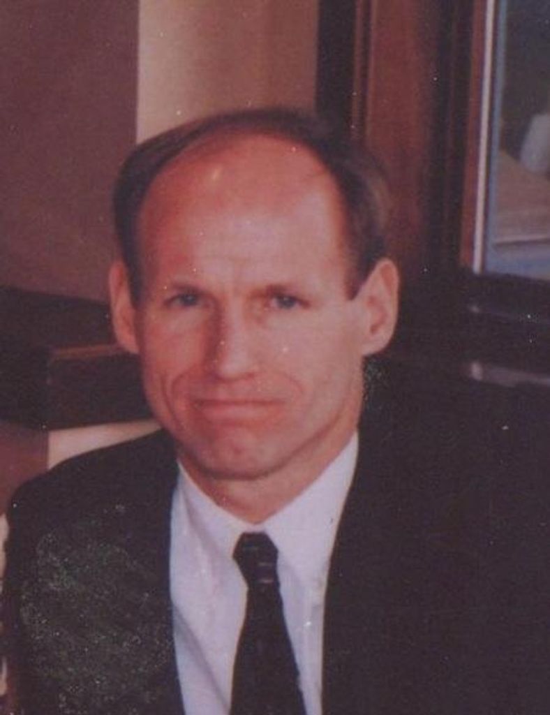 Mark  A. McAtee