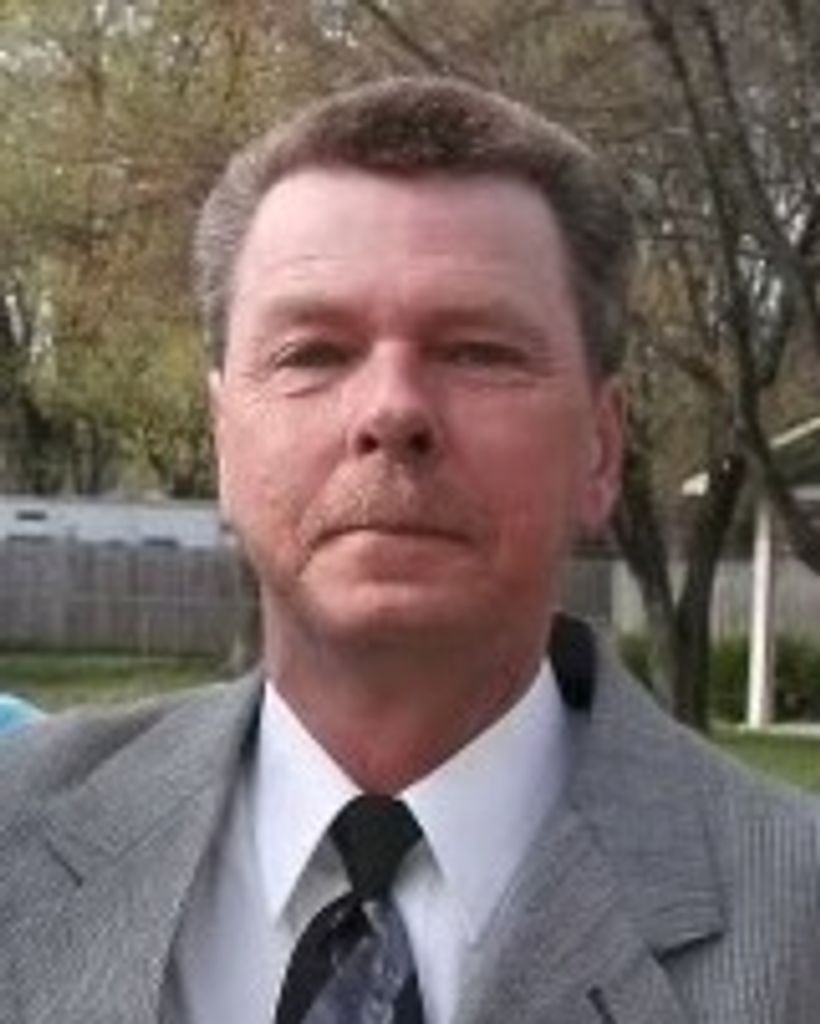 Trauge William May Profile Photo