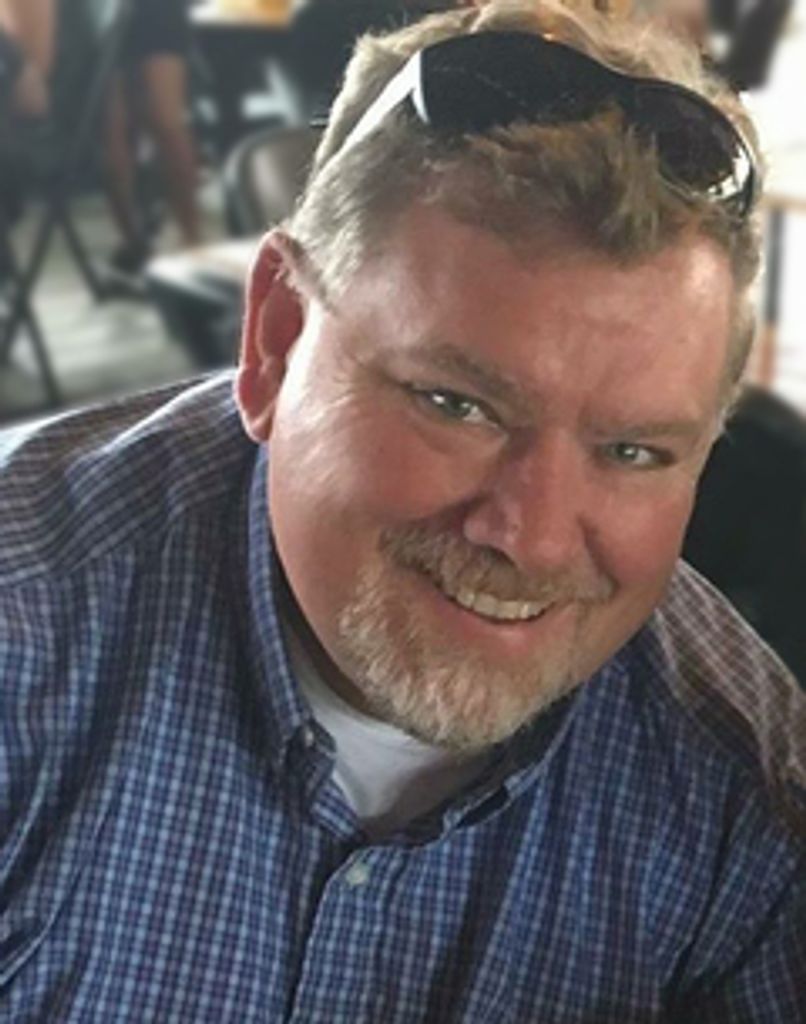 Mark E.  Shelton