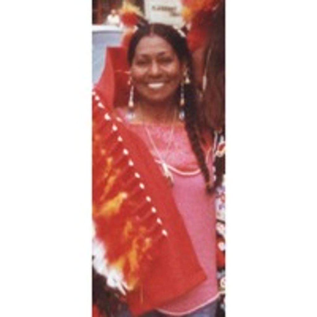 Buffy Red Feather Brown Profile Photo