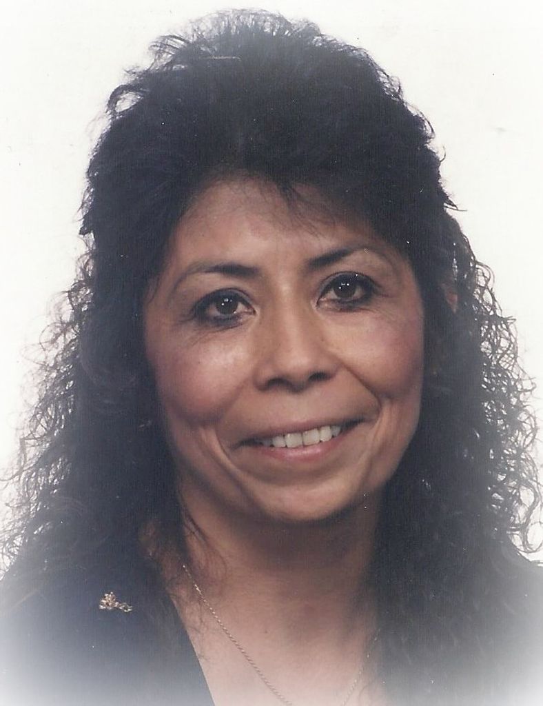 Marie E "Mary" Muñoz