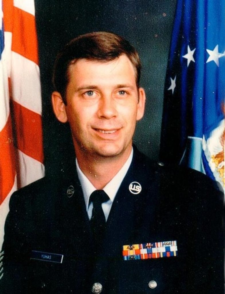 John E. Yuhas
