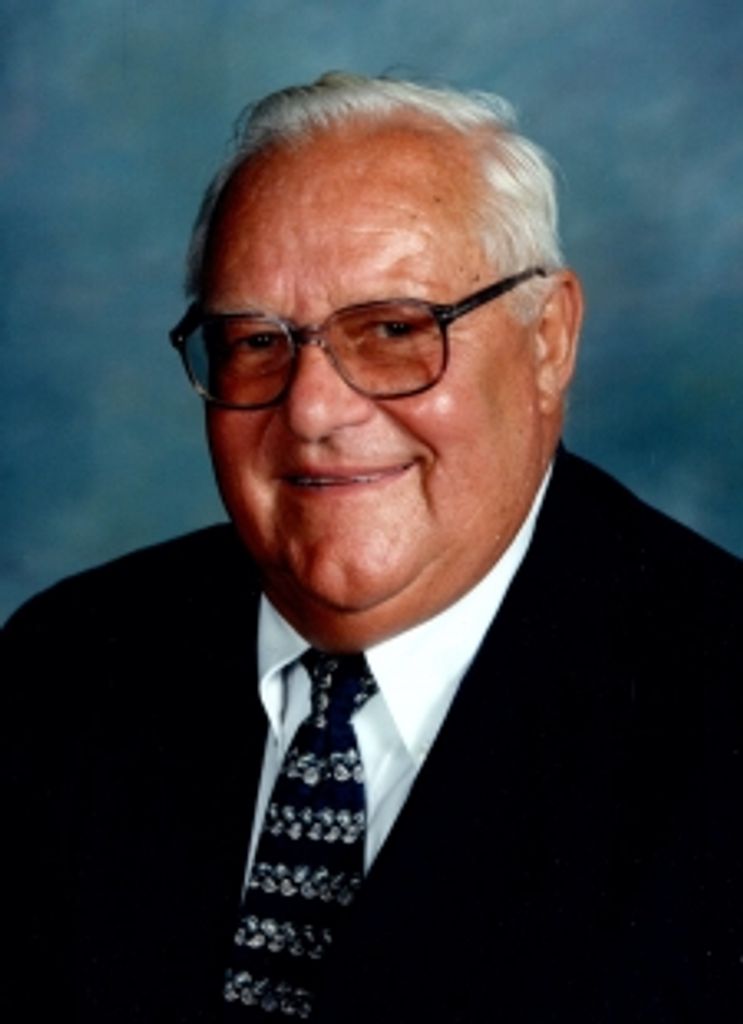 Paul  E. Grollmus
