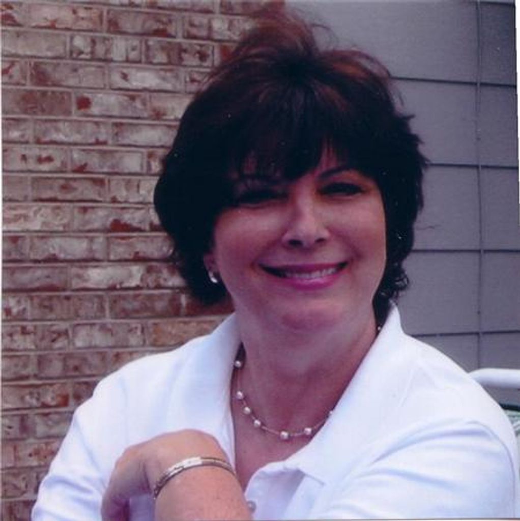 E.  Ann Simmons