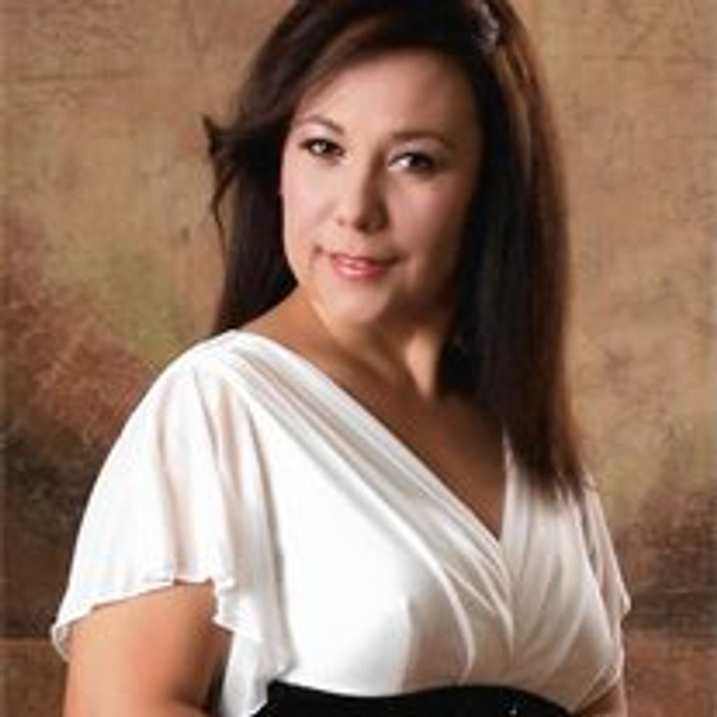 Maria Isabel De la Garza