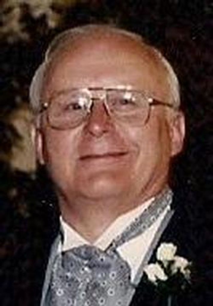 Lowell "Buzz" James Holcomb