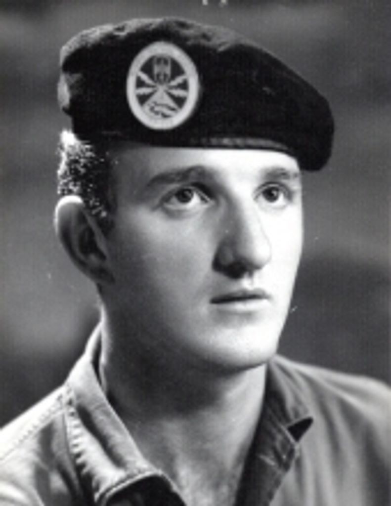 Charles "Charlie" E. Schmitz
