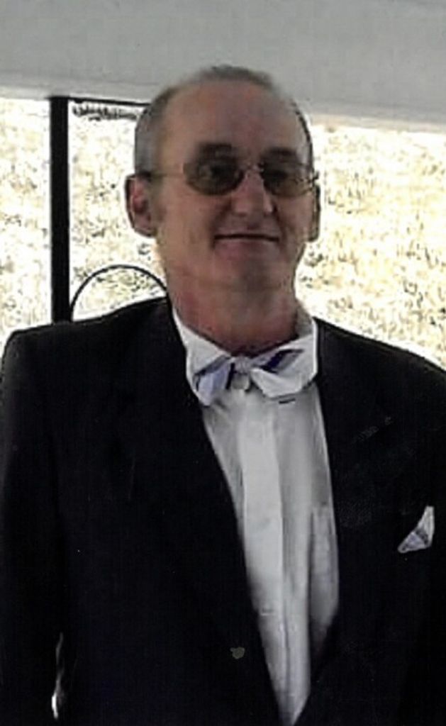 Teddy "Ted" J. Loftis