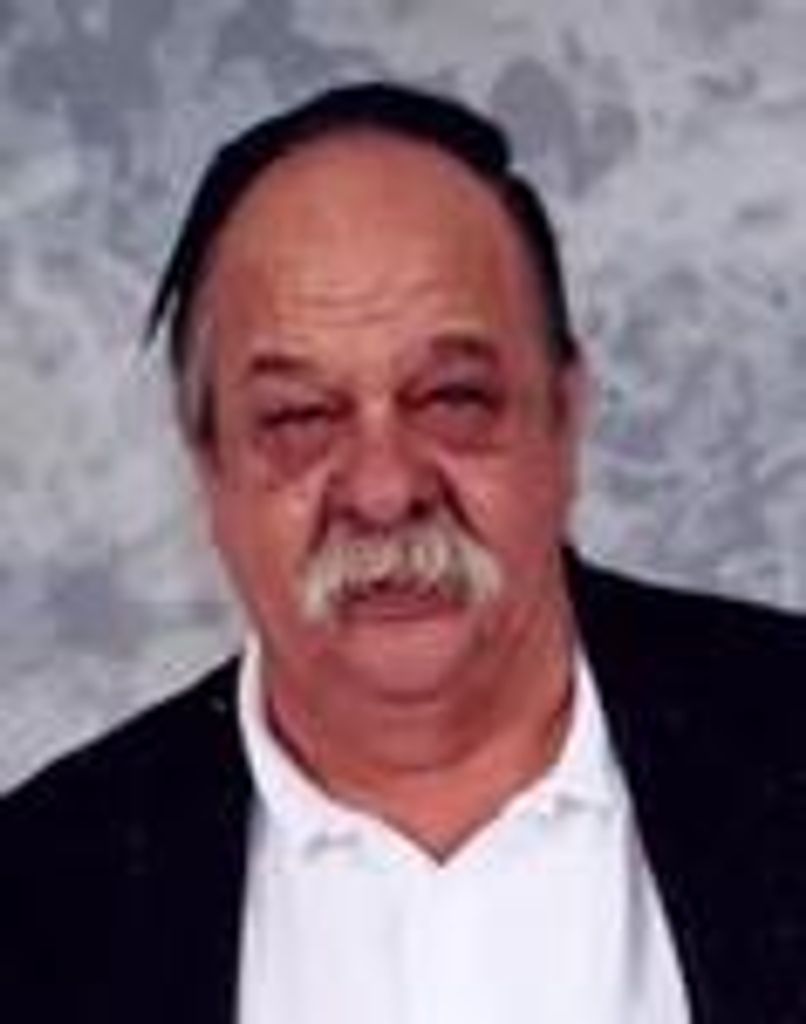 Thomas E. Lom