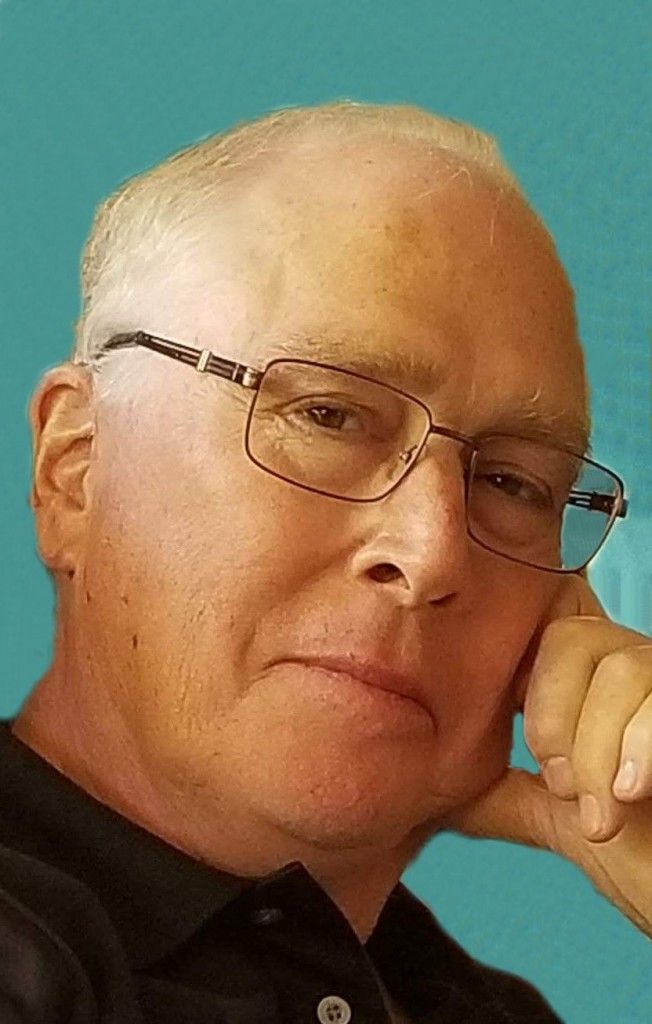 Mark  L. De Bruin
