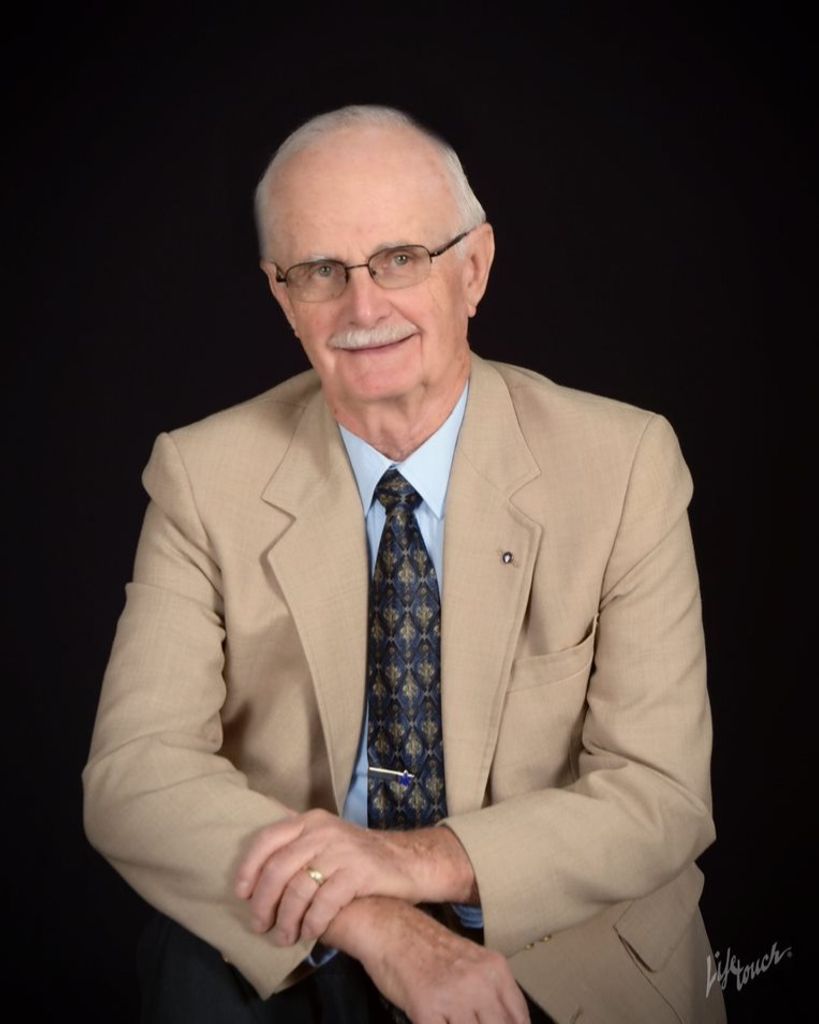 Ray E. Woodcock Profile Photo