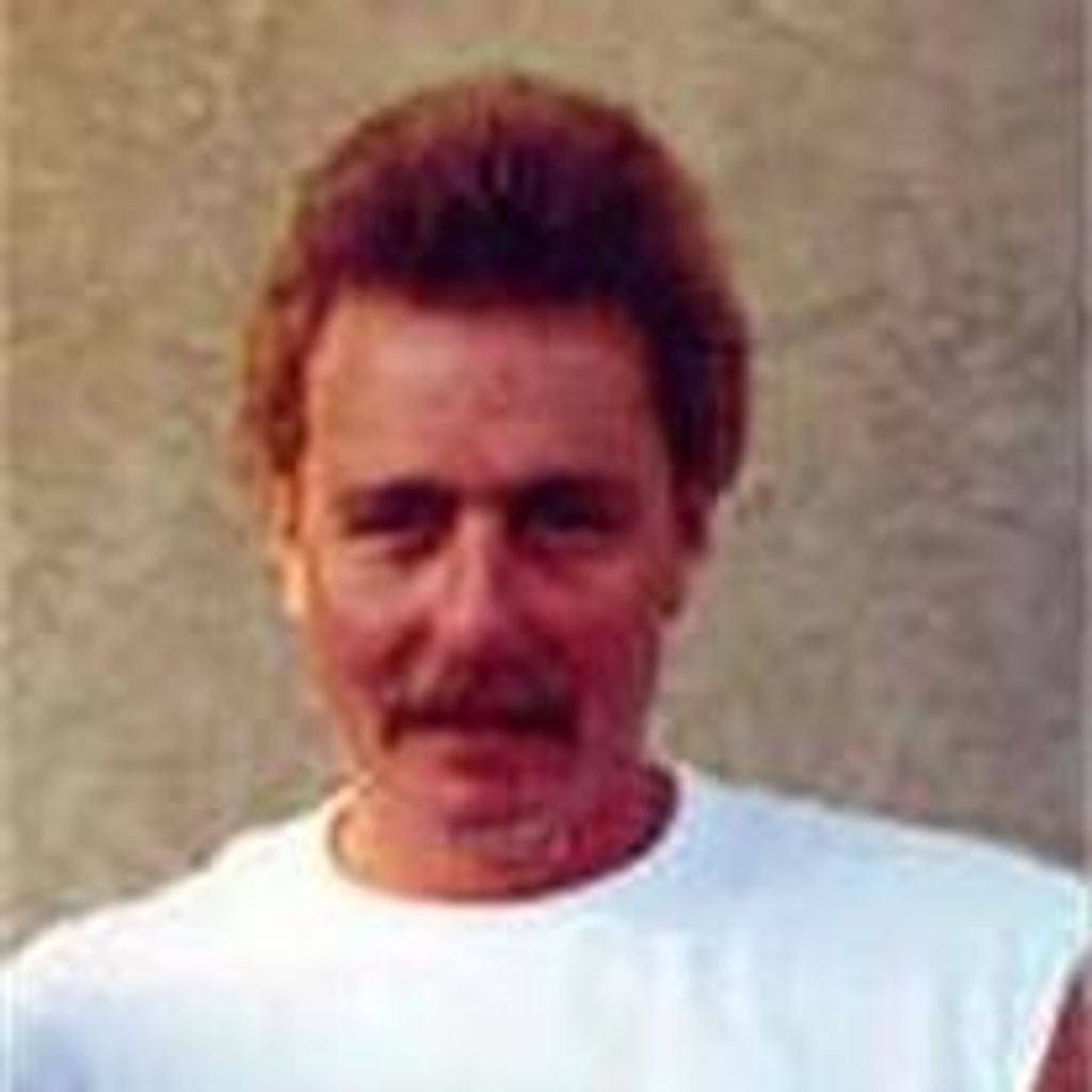 Ken L. Miller