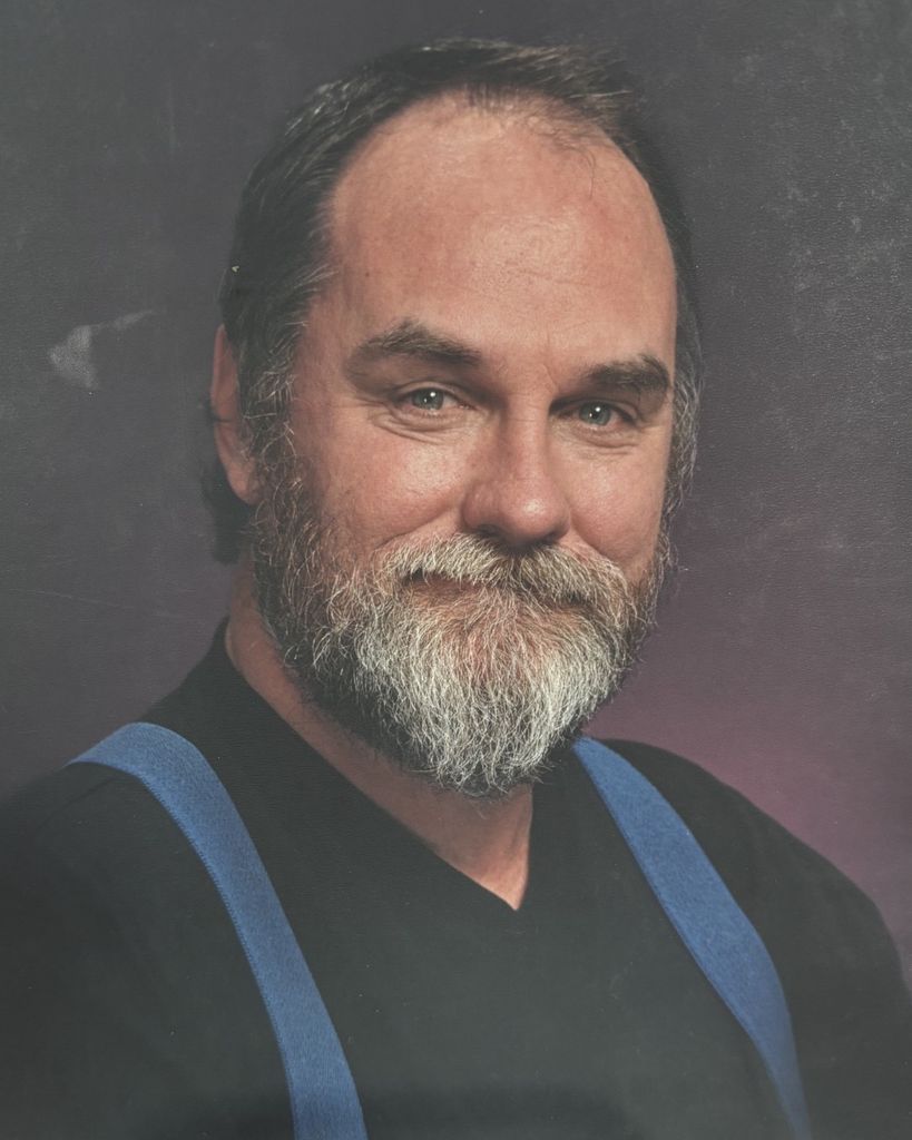 Michael "Mike" Eldon Wollum