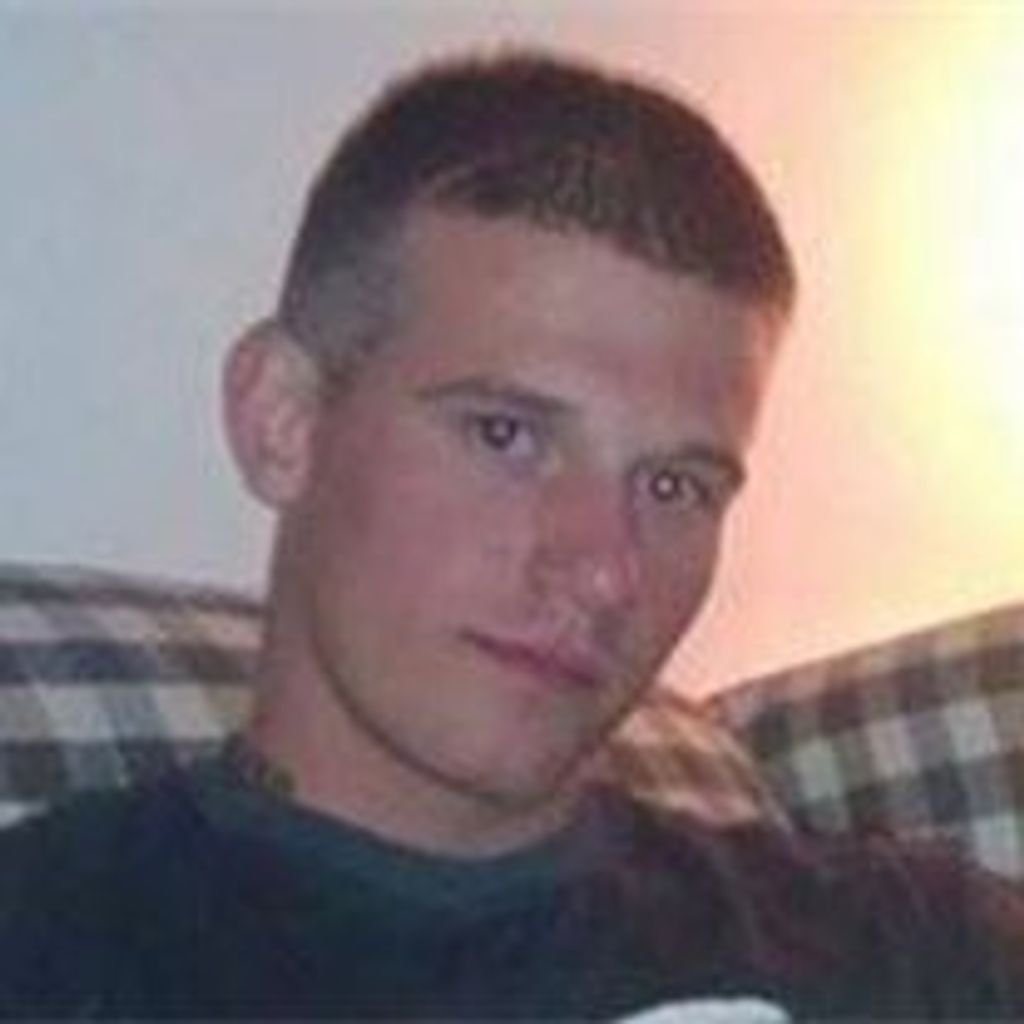Justin A. Mangine