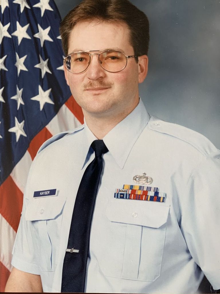 Mark E. Kayser