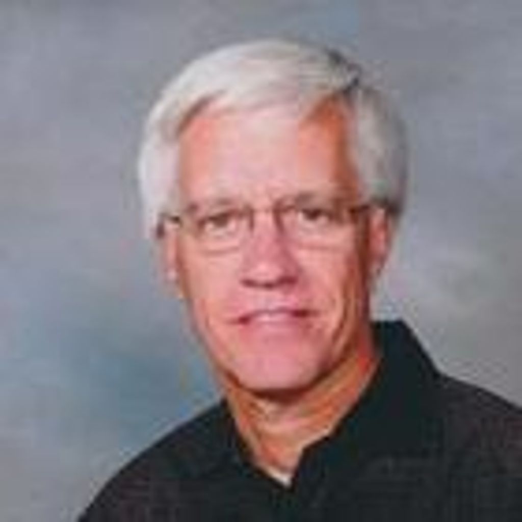 John E Huebert